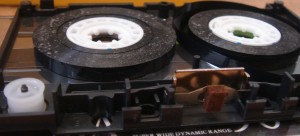 Type IV metal cassette with shell open. Visible thin layer of dust on the surface.