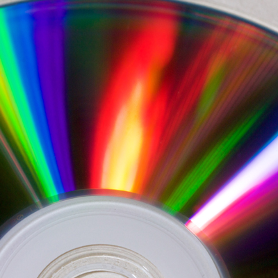 segment of disc reflecting flares of rainbow-coloured light