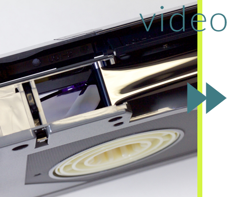 Text: video. Image: D-2 video cassette, shell open to show ¾ inch / 19mm tape inside